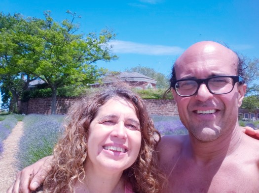 a picture of Gary and Jolie Alony standing in front of a lavender garden